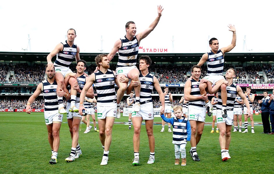 AFL 2015 Rd 23 - Geelong v Adelaide GEELONG, AUSTRALIA - SEPTEMBER 5: (L-R) James Kelly, Steve Johnson and Mathew Stokes of the Cats are chaired off the ground by teammates after their final games during the 2015 AFL round 23 match between the Geelong Cats and the Adelaide Crows at Simonds Stadium, Geelong, Australia on September 5, 2015. (Photo by Adam Trafford/AFL Media)